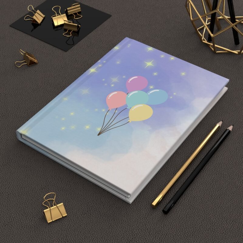 Dreamy purple hardcover journal with pastel balloon illustration