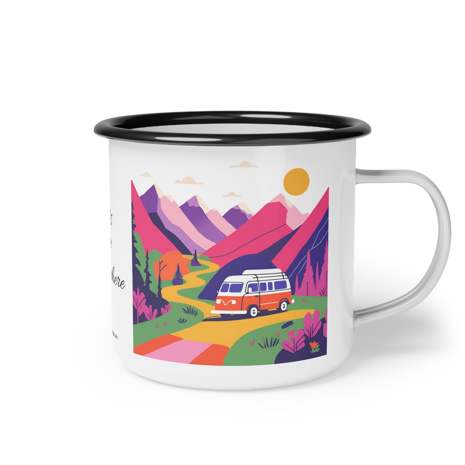 Colorful enamel mug with a camper van and mountain scene design placed on a wooden picnic table at a forest campsite during sunrise.