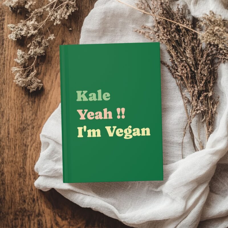 Green hardcover journal with Fun Bold Font featuring the phrase of Kale Yeah!! I'm Vegan on it.