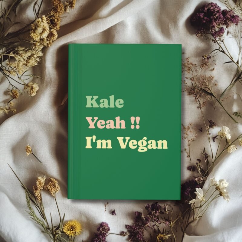 Green hardcover journal with Fun Bold Font featuring the phrase of Kale Yeah!! I'm Vegan on it.