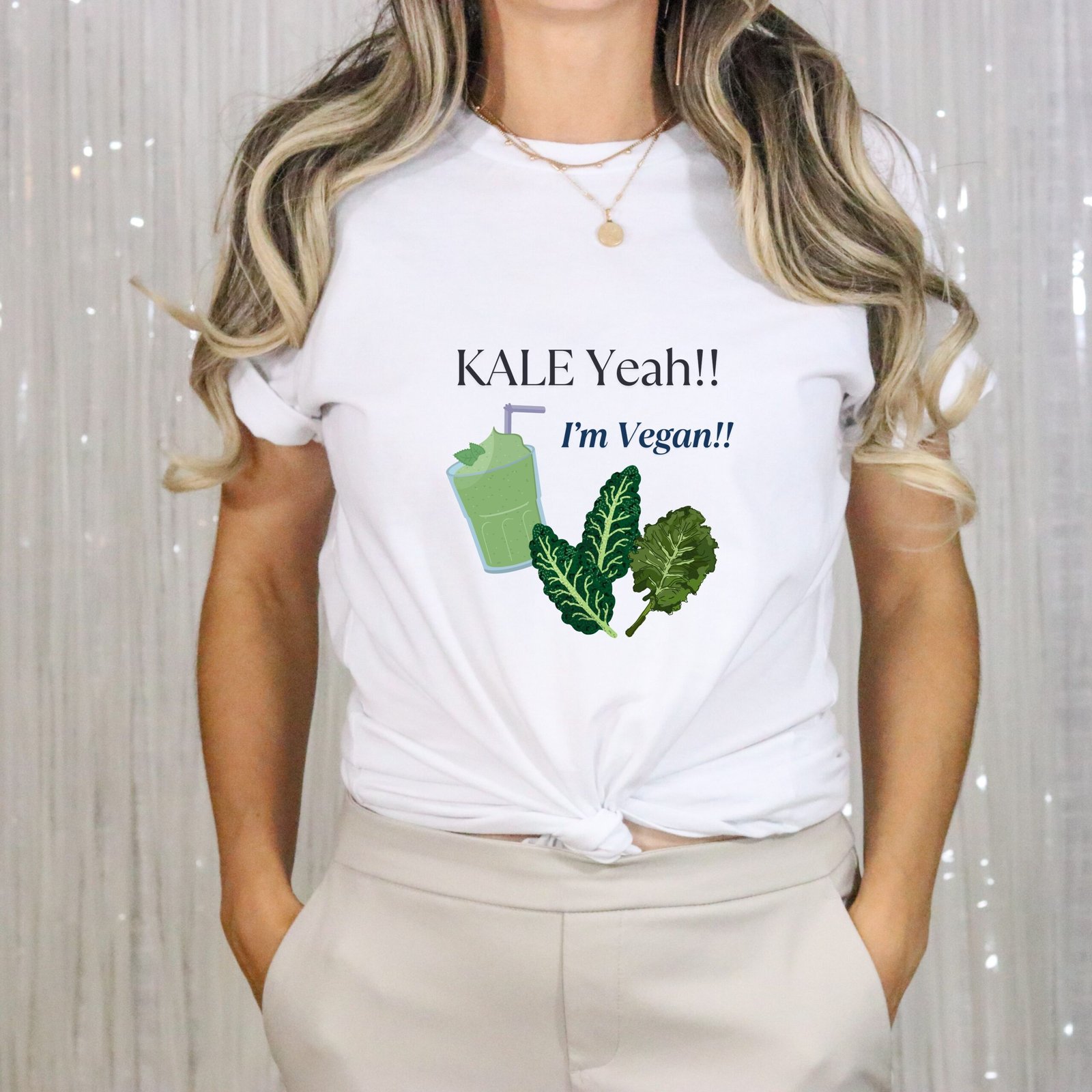 White T-shirt with the phrase ‘KALE Yeah!! I’m Vegan!!’ printed above a green smoothie and leafy kale illustrations, unisex cotton t shirt