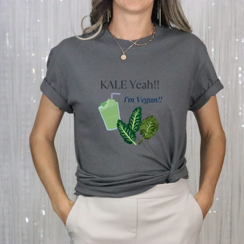 Charcoal Grey T-shirt with the phrase ‘KALE Yeah!! I’m Vegan!!’ printed above a green smoothie and leafy kale illustrations, unisex cotton t shirt