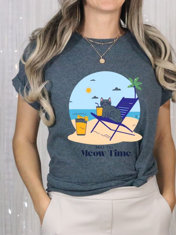 Heather Blue color T-shirt with the phrase ‘Mai Tai, Meow Time’ printed above a cat drinking cocktail on beach chair relaxing by the beach illustration