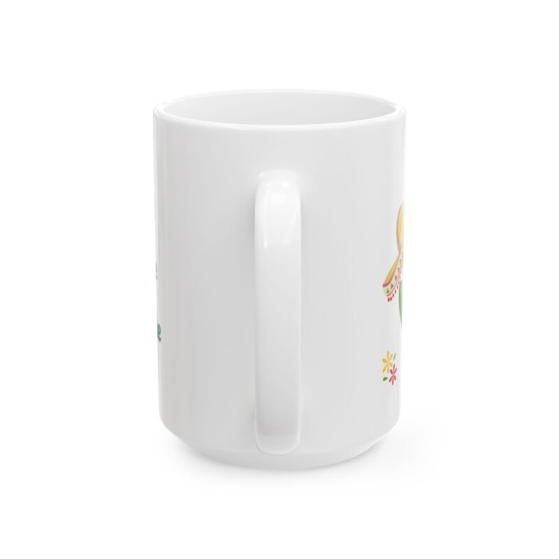 A ceramic mug features a sunny bright festive cactus illustration and writing of spiked with caffeine and sunshine