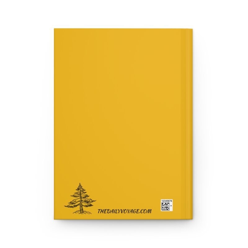 Yellow adventure journal with camper van, mountains, and "Wander far, write freely" quote on cover.