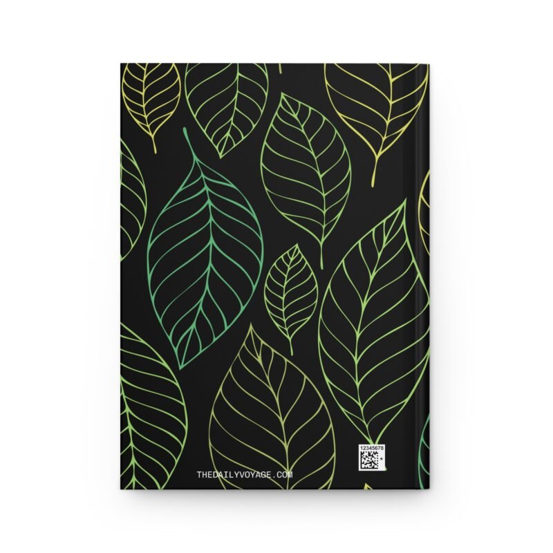 Black hardcover notebook with green and yellow leaf pattern and quote about nourishing the mind and body