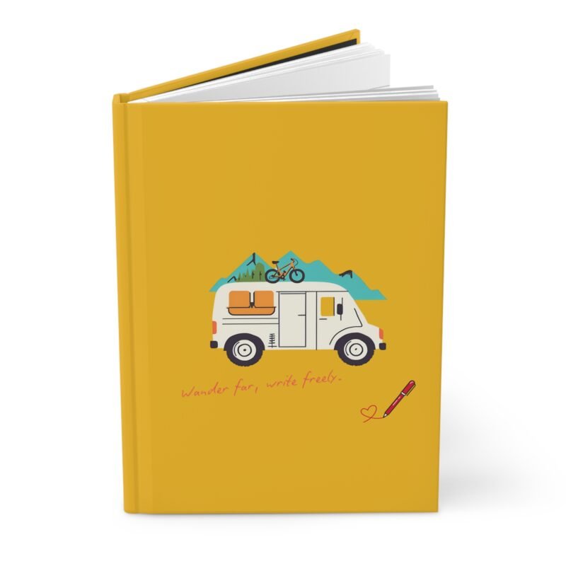 Yellow adventure journal with camper van, mountains, and "Wander far, write freely" quote on cover.